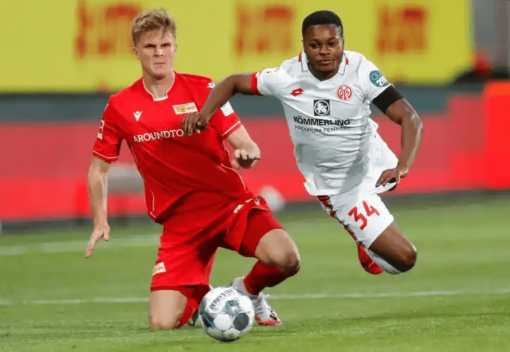 德甲对决:柏林联合残阵死守主场,多特蒙德客场冲冠破局